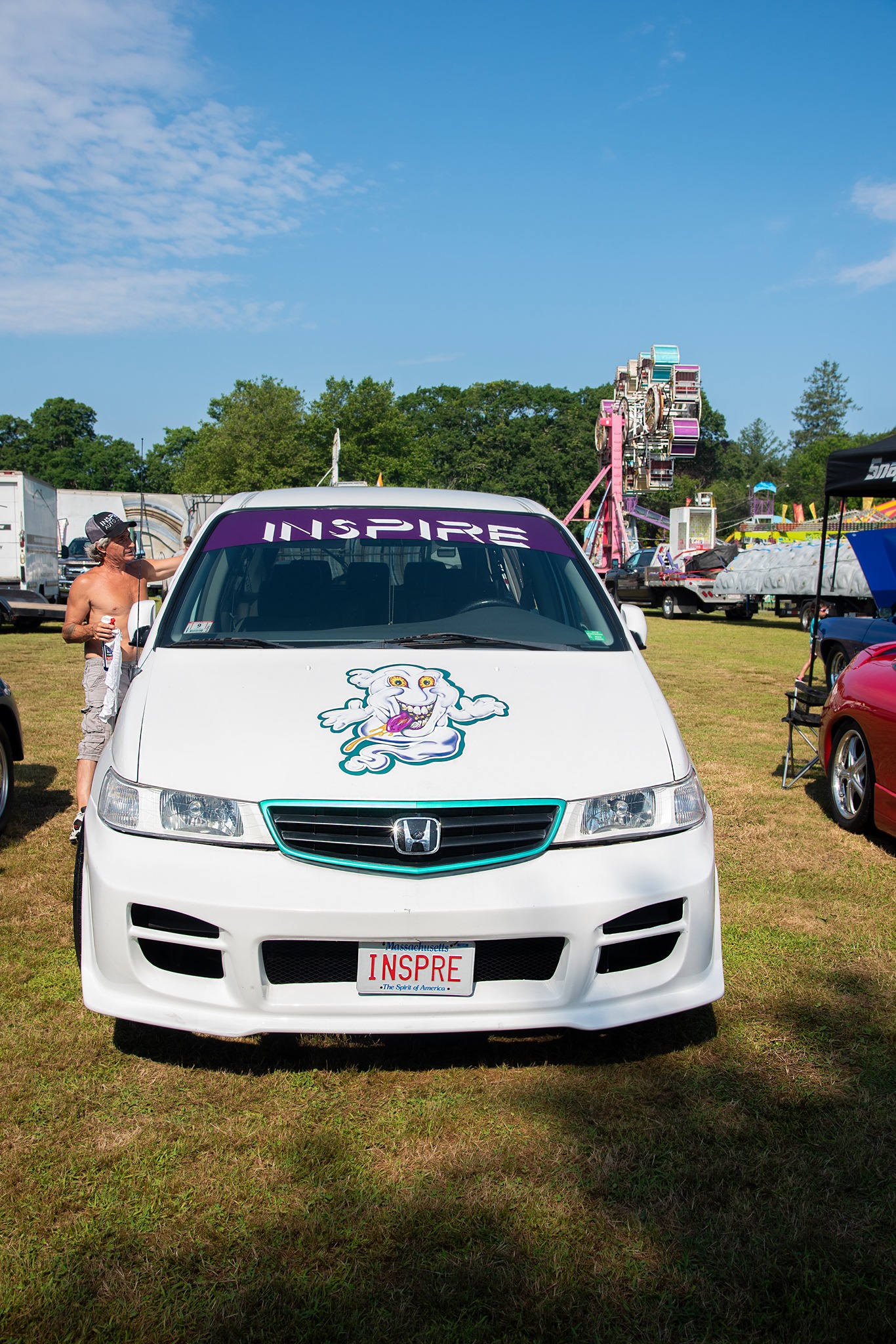 White Honda van with INSPIRE decal